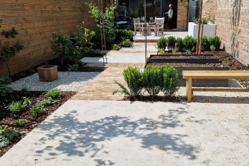 Long terraced garden in Ealing with timber sleepers